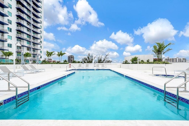 275 NE 18th St Unit 306, Miami, FL 33132 - community pool featuring a patio area