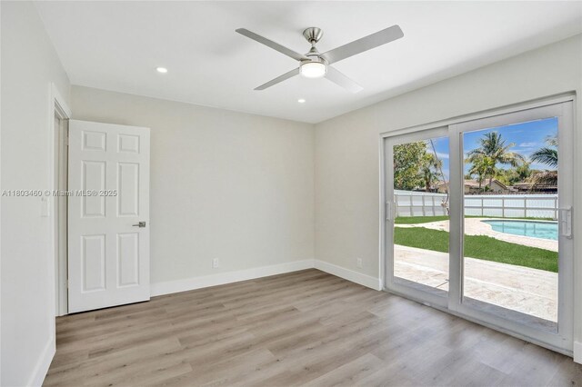 2021 N 53rd Ave, Hollywood, FL 33021 - unfurnished room with light wood-style flooring, baseboards, a ceiling fan, and recessed lighting