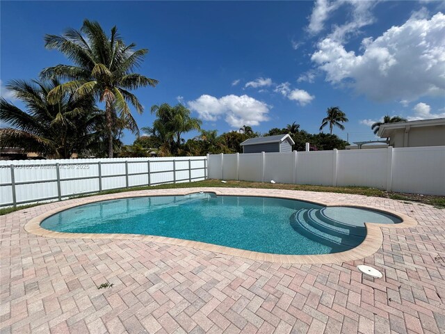 2021 N 53rd Ave, Hollywood, FL 33021 - view of pool with a fenced backyard and a patio area