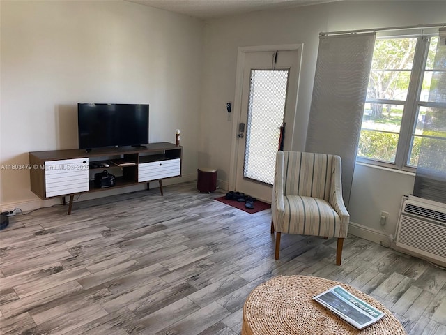 172 Prescott I 172, Deerfield Beach, FL 33442 - living room featuring wood finished floors and baseboards