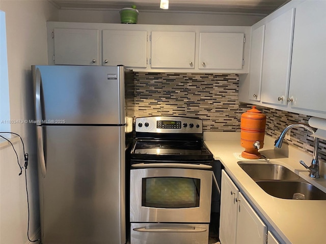 172 Prescott I 172, Deerfield Beach, FL 33442 - kitchen featuring appliances with stainless steel finishes, a sink, light countertops, and white cabinets