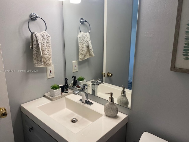 172 Prescott I 172, Deerfield Beach, FL 33442 - half bathroom featuring vanity and toilet
