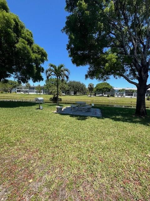 172 Prescott I 172, Deerfield Beach, FL 33442 - view of community featuring a yard