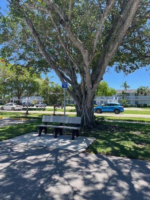 172 Prescott I 172, Deerfield Beach, FL 33442 - surrounding community featuring a lawn