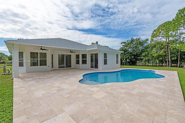 swimming pool featuring a ceiling fan and a patio