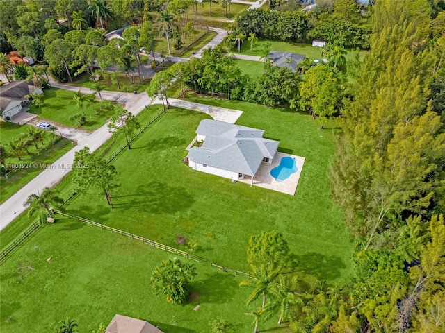 drone / aerial view of a pool