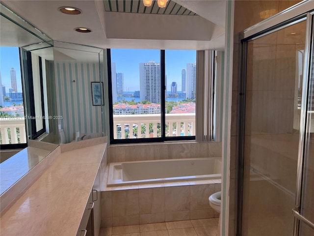 1000 Island Blvd Unit 1508, Aventura, FL 33160 - full bathroom with a view of skyline, tile patterned floors, a garden tub, toilet, and a stall shower