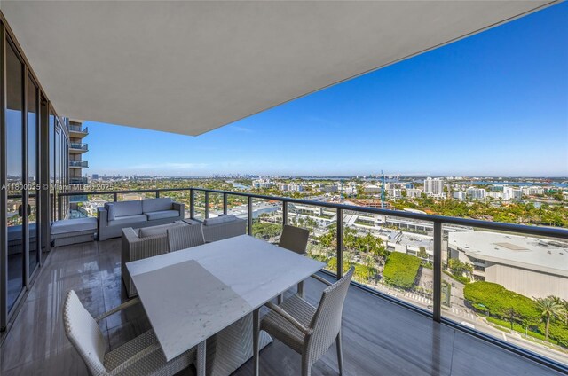 9705 Collins Ave Unit 1805N, Bal Harbour, FL 33154 - balcony featuring outdoor lounge area and a view of city