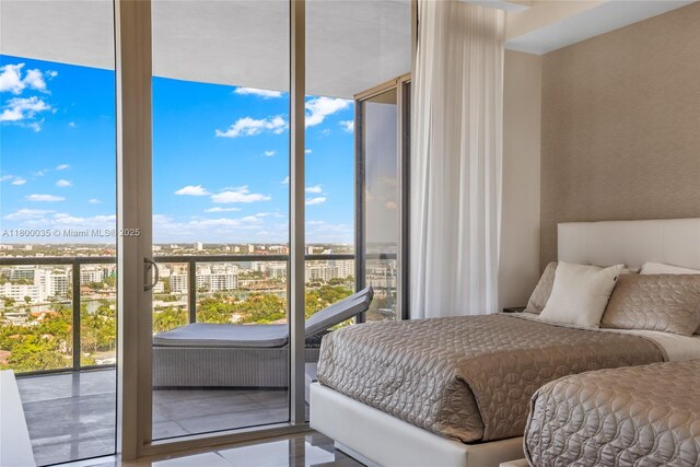 9705 Collins Ave Unit 1805N, Bal Harbour, FL 33154 - bedroom with multiple windows, a view of city, access to outside, and tile patterned floors