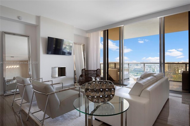 9705 Collins Ave Unit 1805N, Bal Harbour, FL 33154 - living room featuring wood finished floors