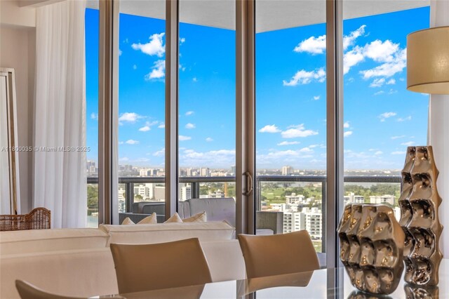 9705 Collins Ave Unit 1805N, Bal Harbour, FL 33154 - dining room with a city view