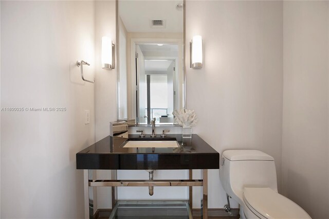 9705 Collins Ave Unit 1805N, Bal Harbour, FL 33154 - bathroom with a sink and toilet