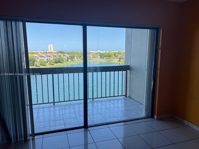 10290 NW 9th St Cir Unit 512, Miami, FL 33172 - tiled spare room with a water view and baseboards