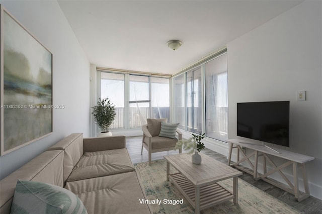 4280 Galt Ocean Dr Unit 23A, Fort Lauderdale, FL 33308 - living area with wood finished floors and a wall of windows