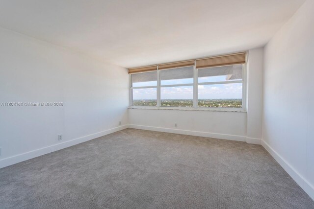 4280 Galt Ocean Dr Unit 23A, Fort Lauderdale, FL 33308 - empty room with light carpet and baseboards