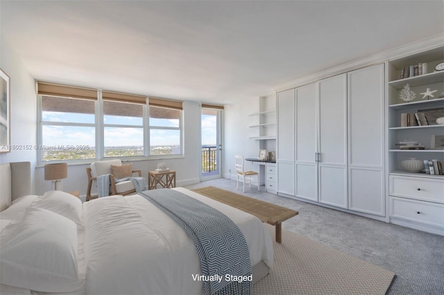 4280 Galt Ocean Dr Unit 23A, Fort Lauderdale, FL 33308 - bedroom featuring light carpet, multiple windows, and access to exterior