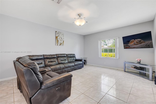 11832 Royal Palm Blvd, Coral Springs, FL 33065 - living room with light tile patterned floors and baseboards