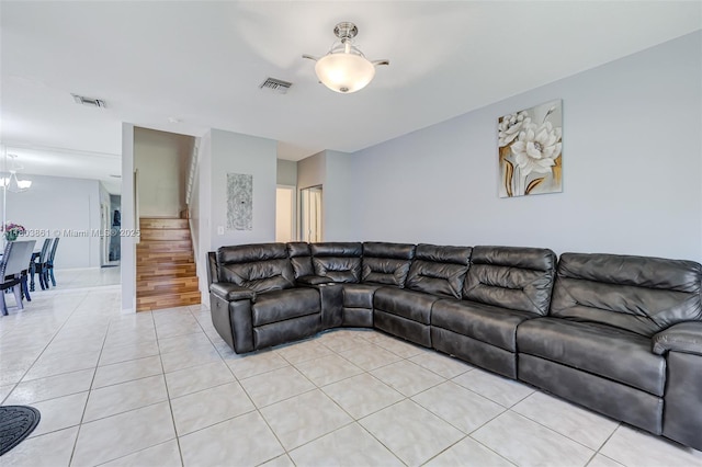 11832 Royal Palm Blvd, Coral Springs, FL 33065 - living area with stairway, light tile patterned floors, and a chandelier