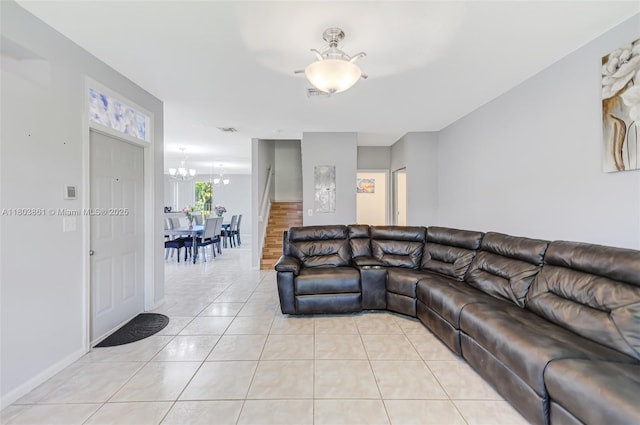 11832 Royal Palm Blvd, Coral Springs, FL 33065 - living area with a chandelier, light tile patterned flooring, and baseboards