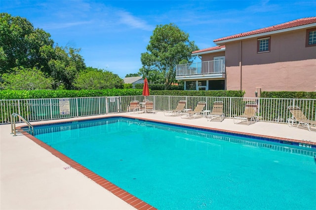 11832 Royal Palm Blvd, Coral Springs, FL 33065 - community pool featuring fence and a patio area