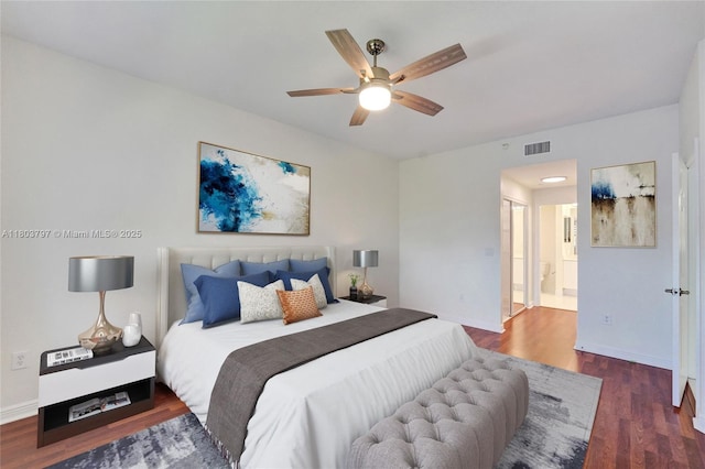 7739 Southampton Ter Unit 415, Tamarac, FL 33321 - bedroom featuring wood finished floors, ensuite bathroom, baseboards, and a ceiling fan