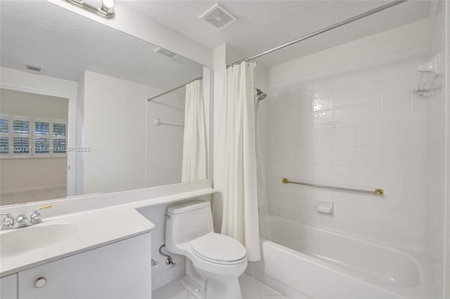 7739 Southampton Ter Unit 415, Tamarac, FL 33321 - bathroom featuring vanity, toilet, tile patterned flooring, shower / bath combo, and a textured ceiling