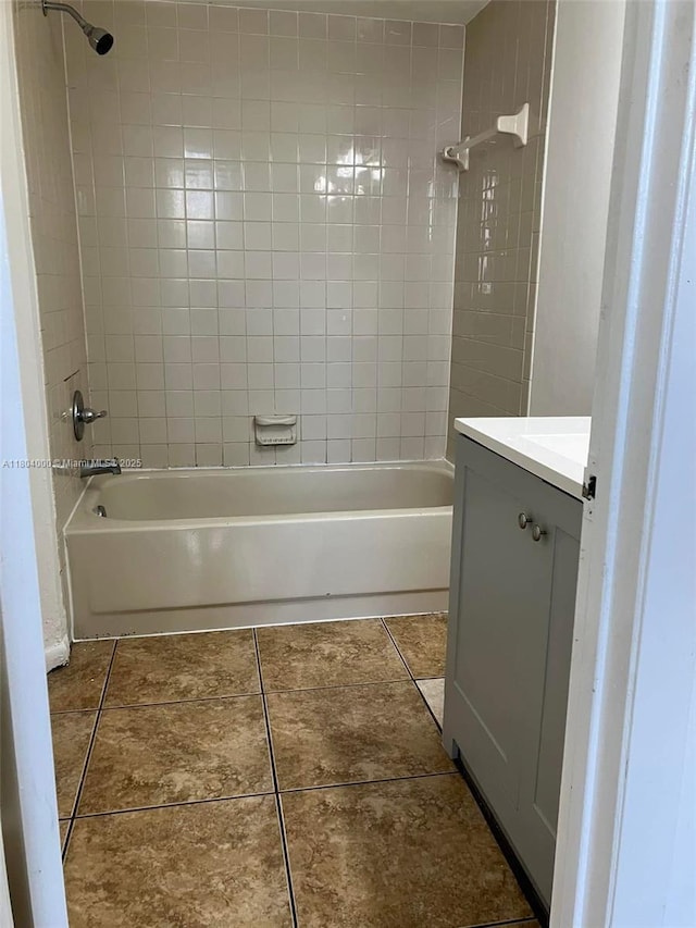 213 Lake Pointe Dr Unit 112, Oakland Park, FL 33309 - full bathroom featuring  shower combination, vanity, and tile patterned flooring