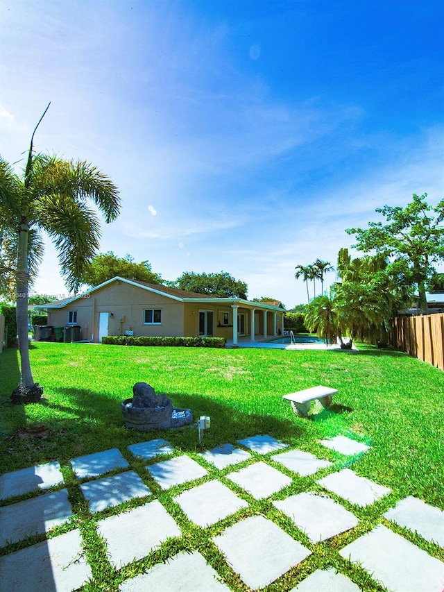 10715 SW 139th Ct, Miami, FL 33186 - view of yard featuring a patio area