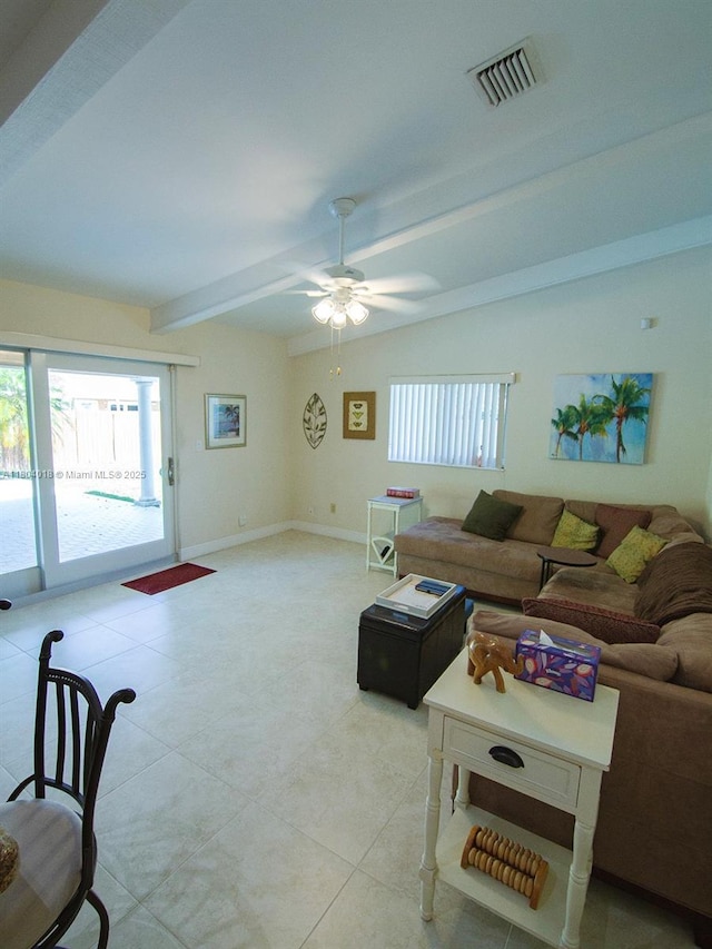10715 SW 139th Ct, Miami, FL 33186 - living area with beam ceiling, light tile patterned floors, ceiling fan, and baseboards