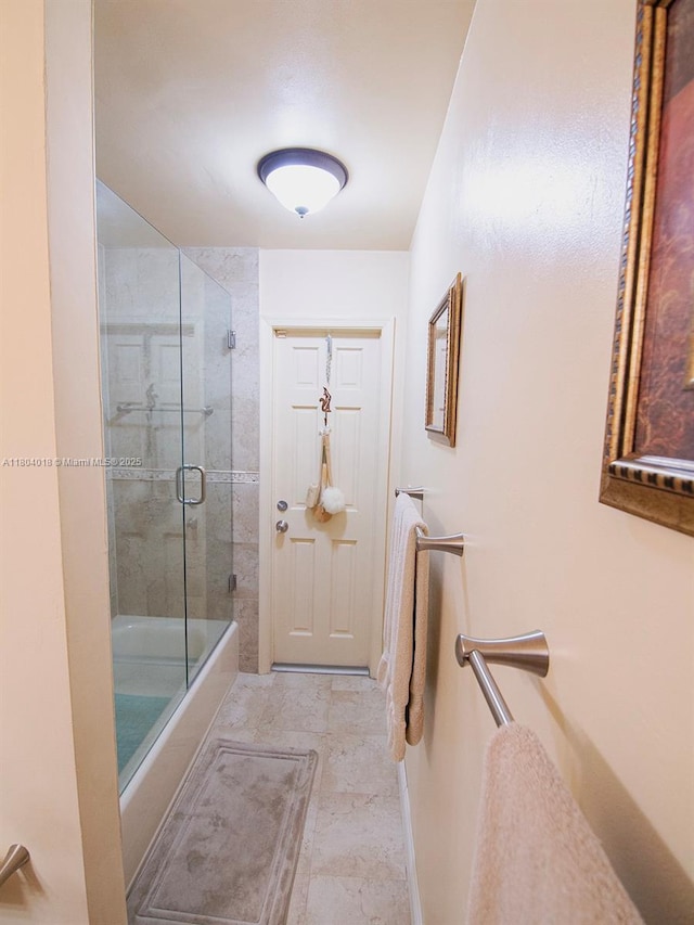 10715 SW 139th Ct, Miami, FL 33186 - full bathroom with combined bath / shower with glass door and baseboards