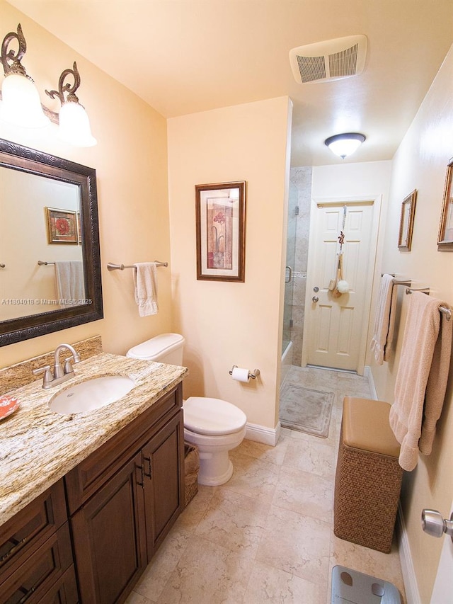 10715 SW 139th Ct, Miami, FL 33186 - bathroom with toilet, vanity, and baseboards