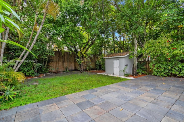 1631 SW 11th St, Miami, FL 33135 - view of yard with a storage shed, a patio, and an outbuilding