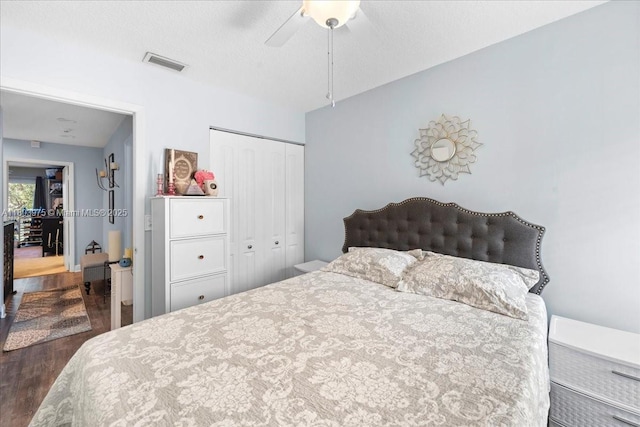 1150 NW 99th Ave Unit 69, Pembroke Pines, FL 33024 - bedroom featuring dark wood finished floors, a closet, and ceiling fan