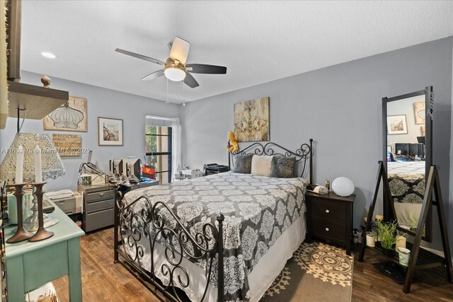 1150 NW 99th Ave Unit 69, Pembroke Pines, FL 33024 - bedroom with wood finished floors, a ceiling fan, and recessed lighting