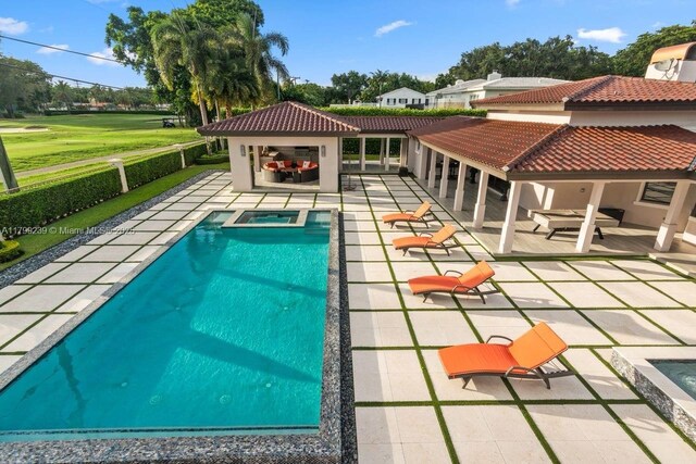 3310 Granada Blvd, Coral Gables, FL 33134 - view of swimming pool with a patio, a pool with connected hot tub, and fence
