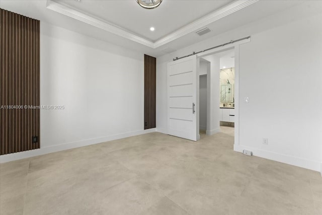 4623 7th St W, Lehigh Acres, FL 33971 - unfurnished bedroom featuring ornamental molding, a raised ceiling, baseboards, and a barn door