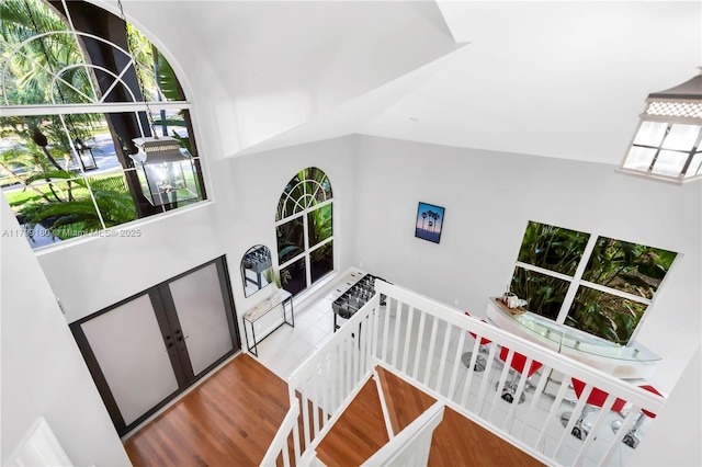 staircase featuring wood finished floors
