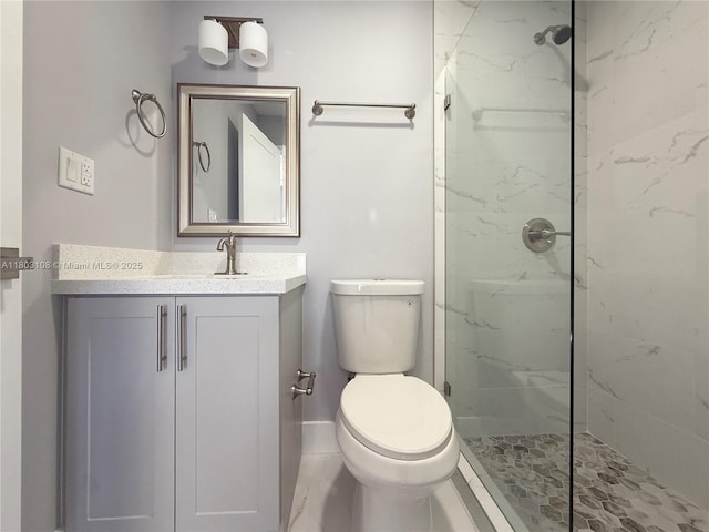 5741 SW 13th St, Miami, FL 33144 - bathroom with a marble finish shower, vanity, toilet, and baseboards