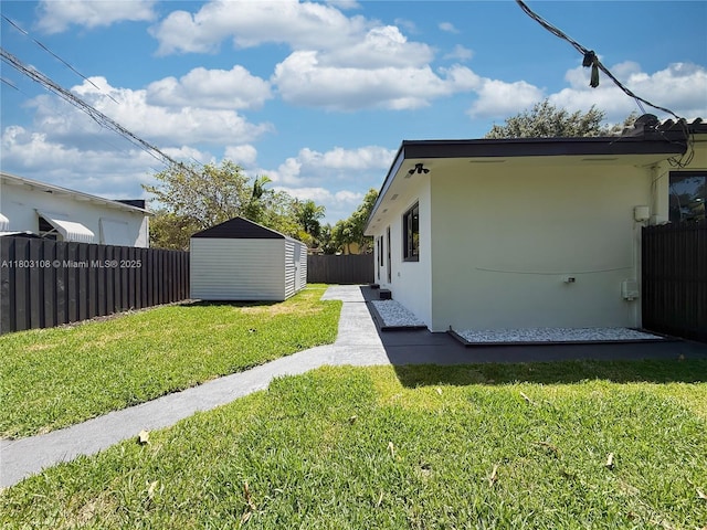 5741 SW 13th St, Miami, FL 33144 - view of side of property with a shed, an outdoor structure, and stucco siding