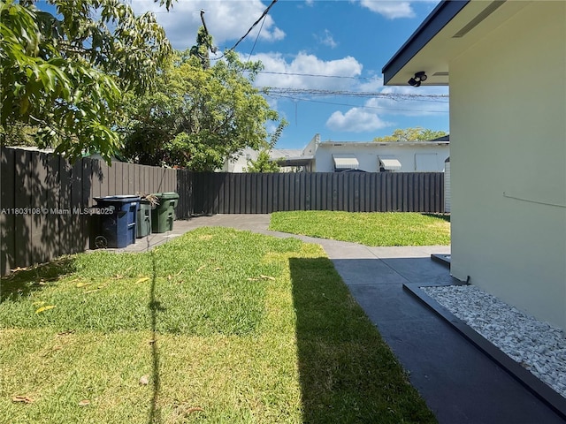 5741 SW 13th St, Miami, FL 33144 - view of yard featuring a patio area