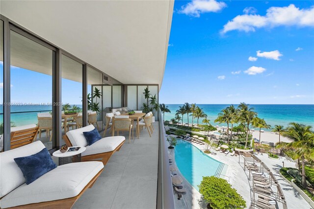 18975 Collins Ave Unit 404, Sunny Isles Beach, FL 33160 - balcony featuring a water view and view of pool area