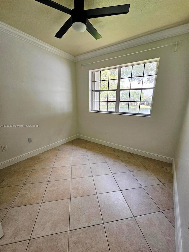 2151 NW 96th Ter Unit 15L, Pembroke Pines, FL 33024 - spare room featuring crown molding, light tile patterned flooring, a ceiling fan, and a textured ceiling