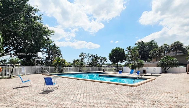 2151 NW 96th Ter Unit 15L, Pembroke Pines, FL 33024 - community pool featuring a patio area