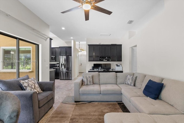 112 SW N Danville Cir, Port St Lucie, FL 34953 - living room featuring a ceiling fan, lofted ceiling, and recessed lighting