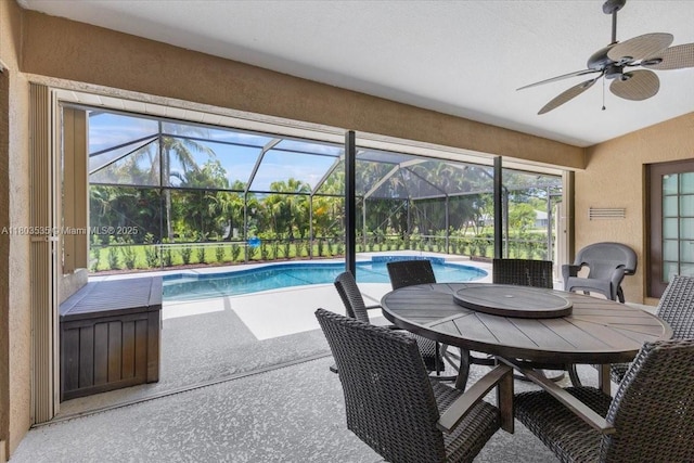 112 SW N Danville Cir, Port St Lucie, FL 34953 - outdoor pool with a ceiling fan, outdoor dining area, a patio, and a lanai