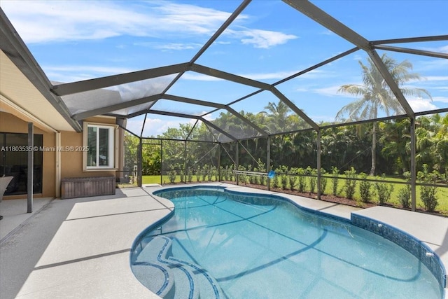 112 SW N Danville Cir, Port St Lucie, FL 34953 - swimming pool with a patio and glass enclosure