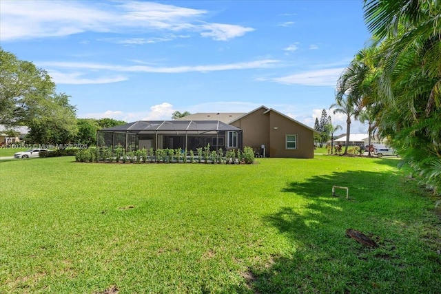 112 SW N Danville Cir, Port St Lucie, FL 34953 - view of green lawn with a lanai