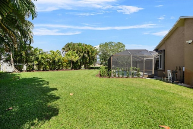 112 SW N Danville Cir, Port St Lucie, FL 34953 - view of green lawn featuring a lanai