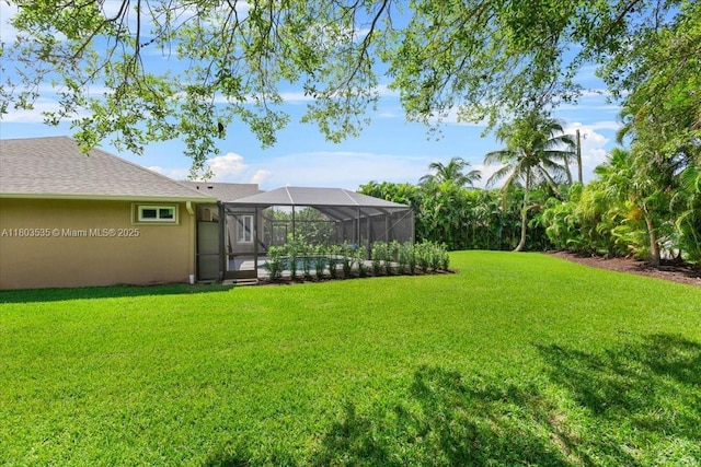 112 SW N Danville Cir, Port St Lucie, FL 34953 - view of grassy yard featuring a lanai