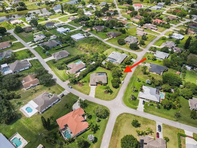 112 SW N Danville Cir, Port St Lucie, FL 34953 - aerial view of property's location with a nearby body of water and nearby suburban area